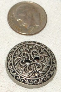 Antiqued Metal Button a two-hole antiqued metal button
